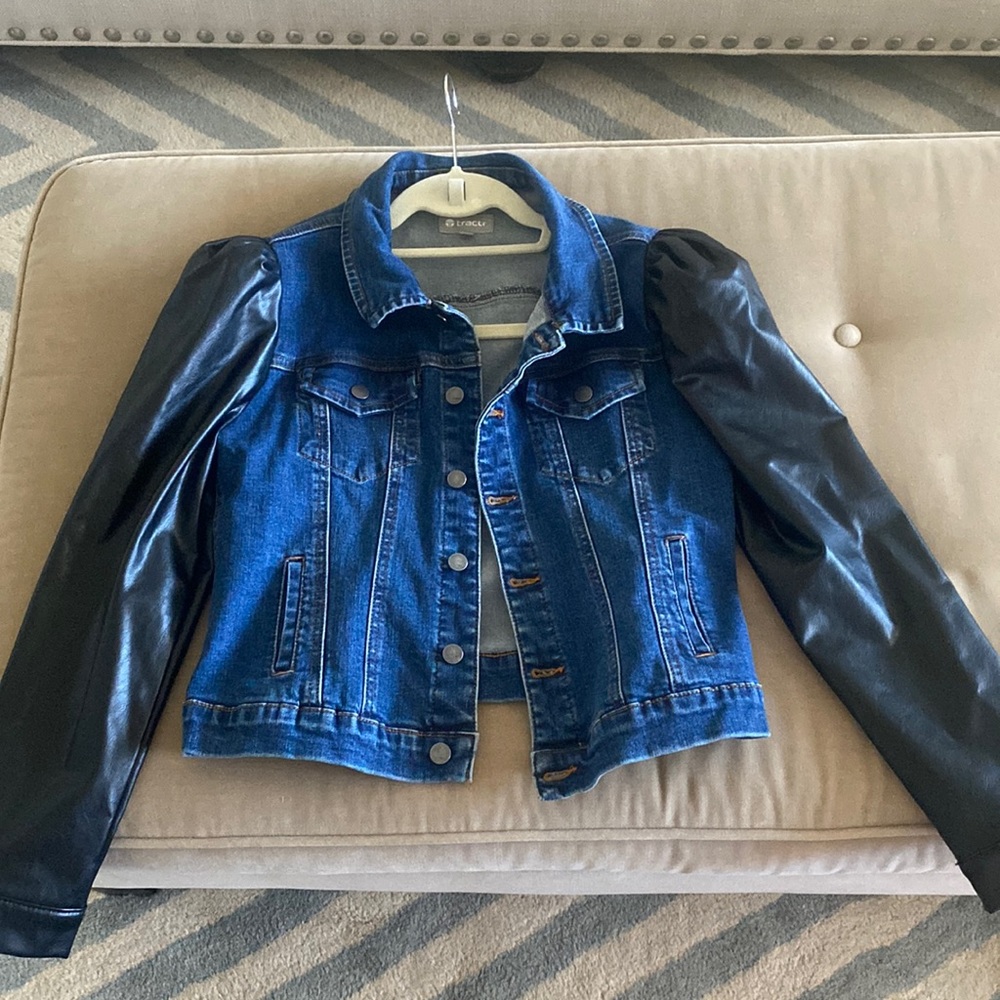 Tractr denim jacket with puff faux leather sleeves.